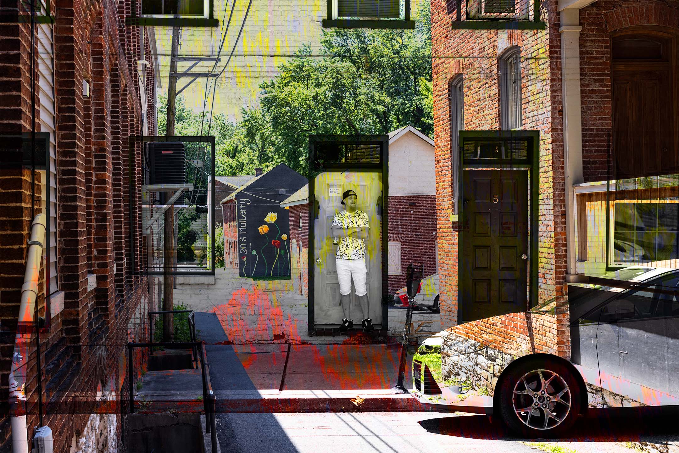Man standin with images of a street with buildings and cars layered
